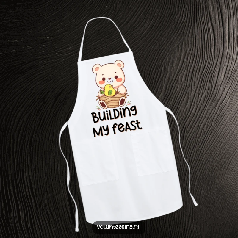 Funny Apron: A cheerful bear helps a tiny bird build a nest, perfect for a kitchen that values teamwork and fun.