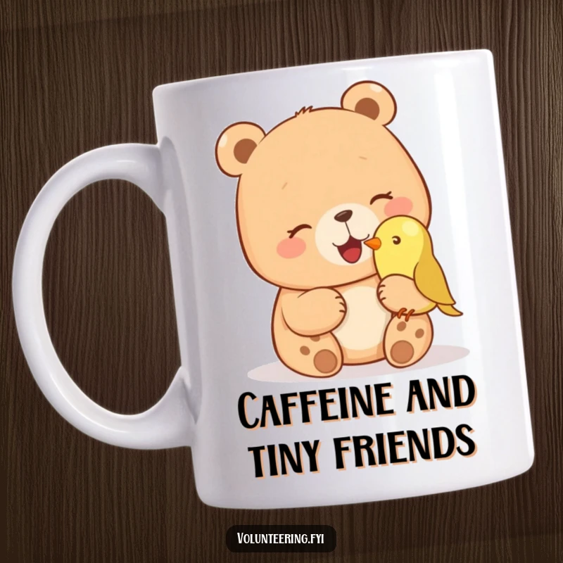 Funny mug with a giggling bear gently petting a small bird on its nose, showcasing a humorous and heartwarming wildlife moment. Perfect funny gift.