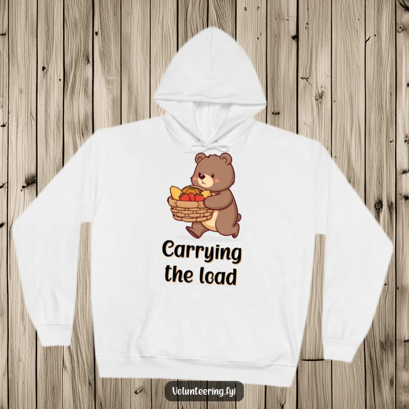 Funny bear hoodie, a determined bear carrying a large basket of donated food, offering cozy comfort and a message of support.