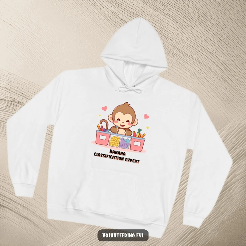 Funny kawaii monkey hoodie, depicting a cute monkey meticulously sorting colorful items into separate bins, promoting tidiness and fun.