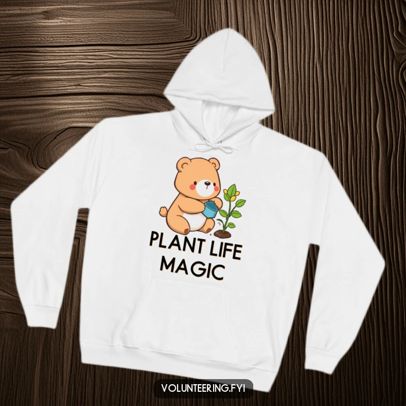Funny bear hoodie, a contented cartoon bear carefully watering a sprouting plant, radiating peacefulness and joy.