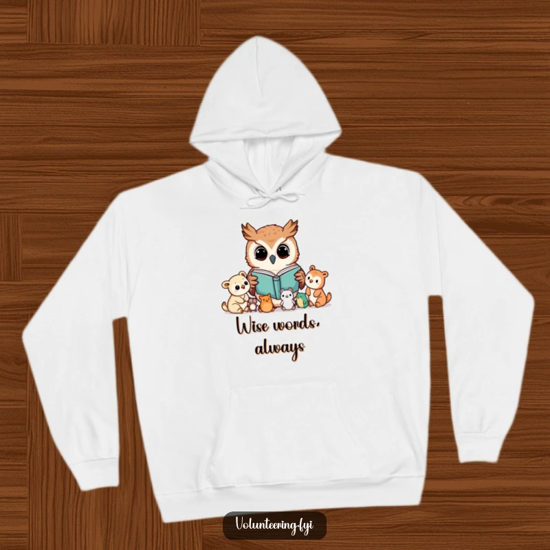 Funny hoodie showcasing a Kawaii owl character reading a book to a group of attentive young animals, cozy and educational apparel.