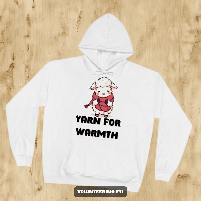 Funny Sheep Knitting Hoodie: A plush cartoon sheep happily knitting a long, colorful scarf, designed for maximum coziness and amusement.