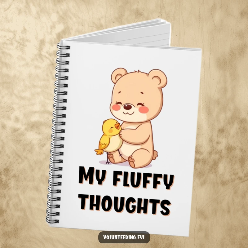 Funny notebook with a happy bear cub gently patting a bird, ideal for journaling or note-taking.