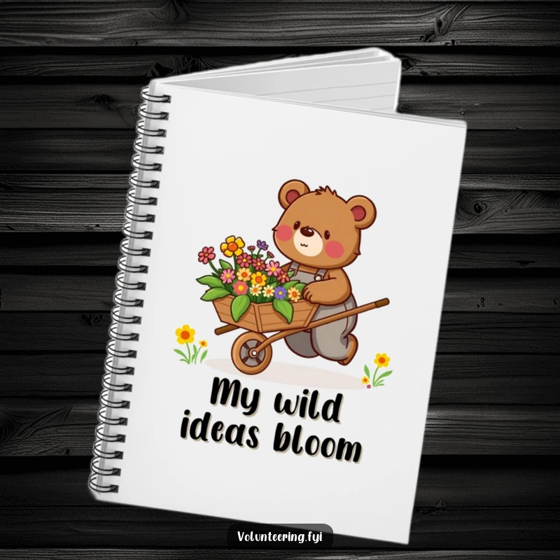 Funny Notebook: Determined brown bear in overalls enthusiastically pushes a wheelbarrow filled with colorful flowers, for writing.