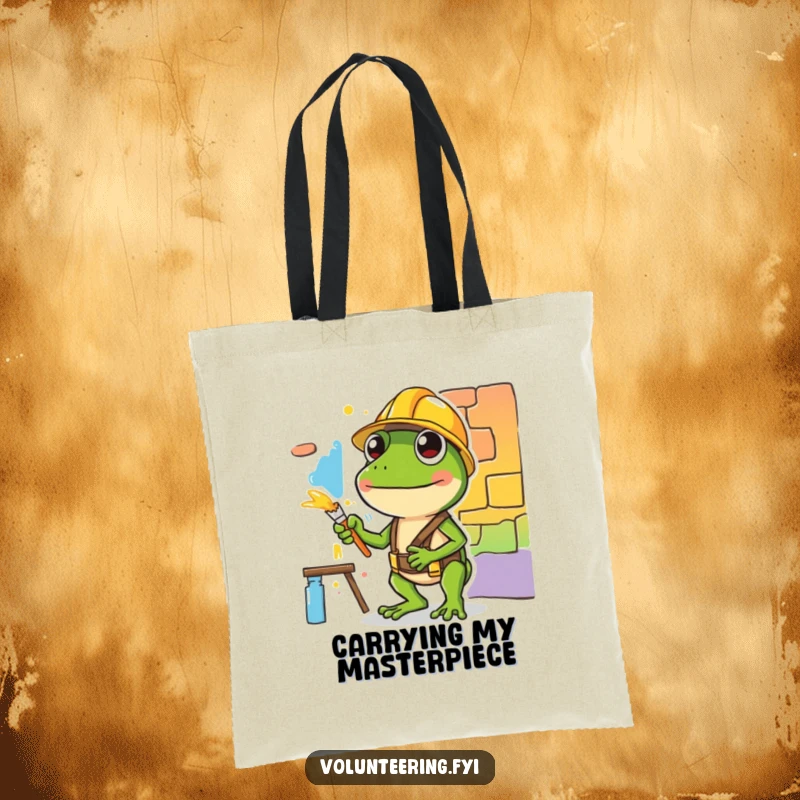 Funny tote bag showcasing a diligent green frog in a hard hat painting a mural, perfect for carrying supplies with humorous style.